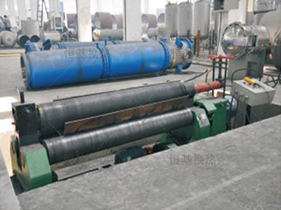 Spiral plate forming and rolling machine